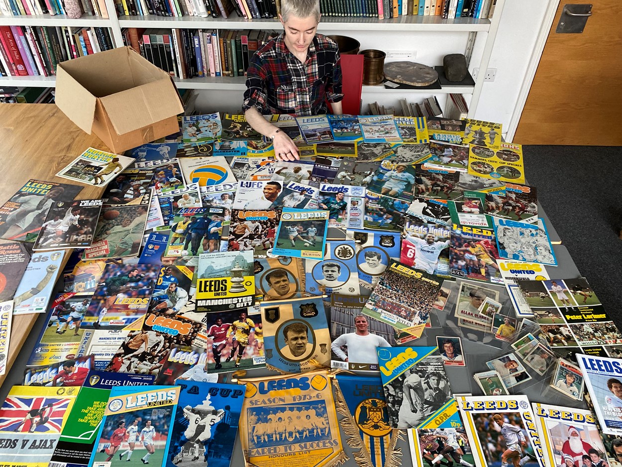 LUFC programme donation: Amy Thraves-Connor has been working on a placement with Leeds Museums and Galleries, scouring through boxes of the donated programmes, searching for those which help tell both the story of the club and how the team has influenced life in Leeds both on and off the pitch.