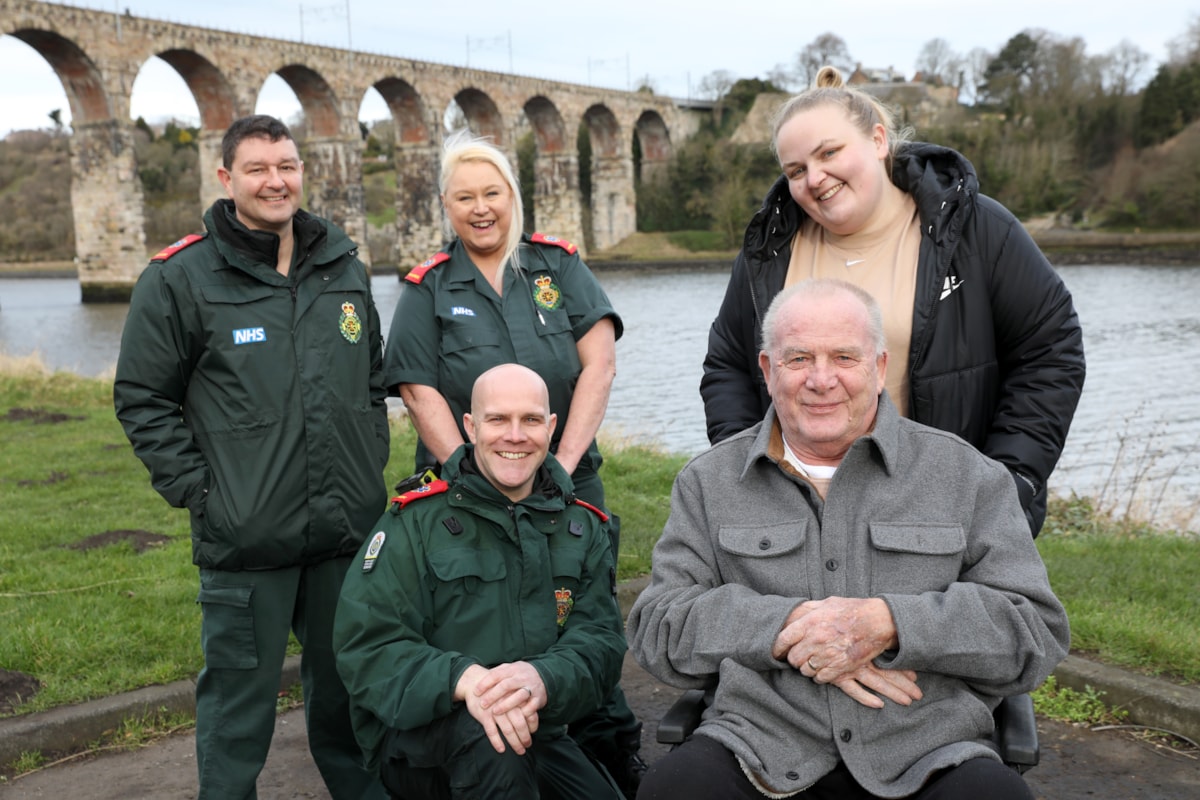 Berwick community paramedics (L-R) Paul Mills, Julie Cowell, and Wayne McKay (front), with Laura Brown and Ian Wilson, who regularly use the service.