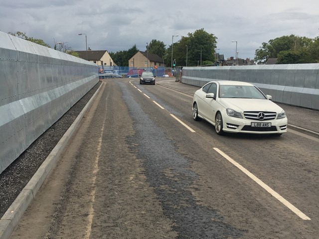 Network Rail open £4m Baillieston railway bridge two weeks early: 15 Aug Muirhead Road First Cars-3