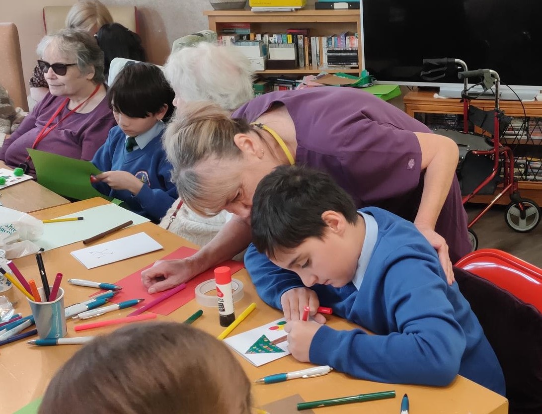 One of the children hard at work making unique cards