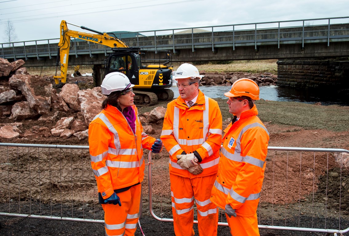 Ministers review West Coast Mainline recovery works: Lamington Viaduct - UK Rail Minister Claire Perry, Network rail MD for ScotLand Phil Verster (centre) and Scottish Transprt Minister Derek Mackay review recovery works