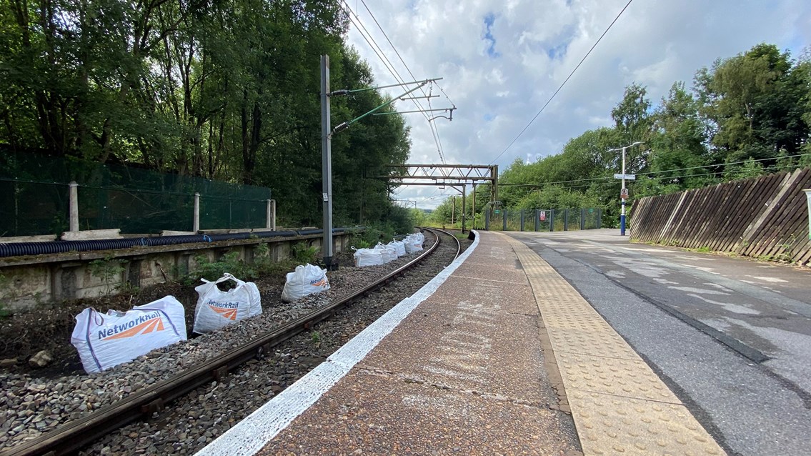 Bags of ballast at Dinting station ready for the August improvement work