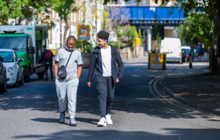Two people walking along Richmond Road in Hackney - credit Gary Manhine