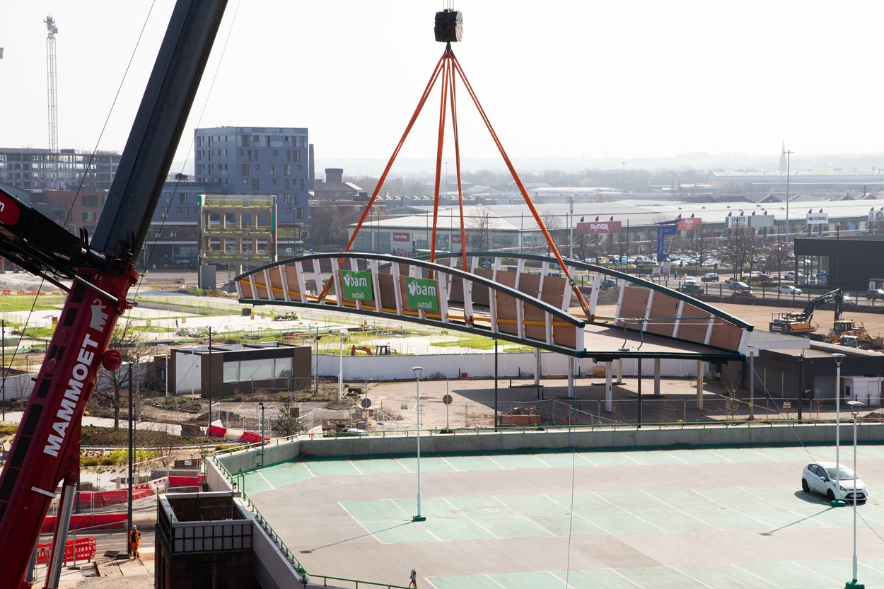 David Oluwale bridge installation: The David Oluwale bridge is lifted into place over the River Aire in Leeds. Engineers working on the David Oluwale bridge completed one of the project’s major milestones over the weekend, with cranes carefully placing the 40 tonne structure over the river where it will connect Sovereign Street to Water Lane.