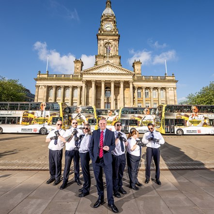 Nigel Featham, Managing Director of Go North West, with drivers at the launch of a campaign to recruit 300 bus drivers for Manchester's new integrated transport network.