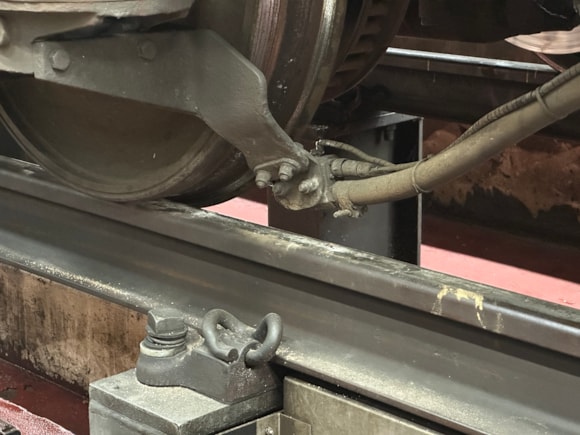 Single Variable Rate Sanding system - The new sanding system for the Class 158 and Class 159 trains, which deposits sand much more efficiently. Traces of sand are seen on the rail.