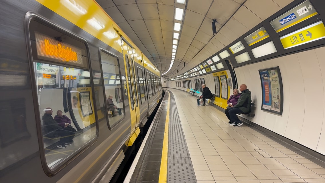 A Wirral line train to New Brighton at a platform