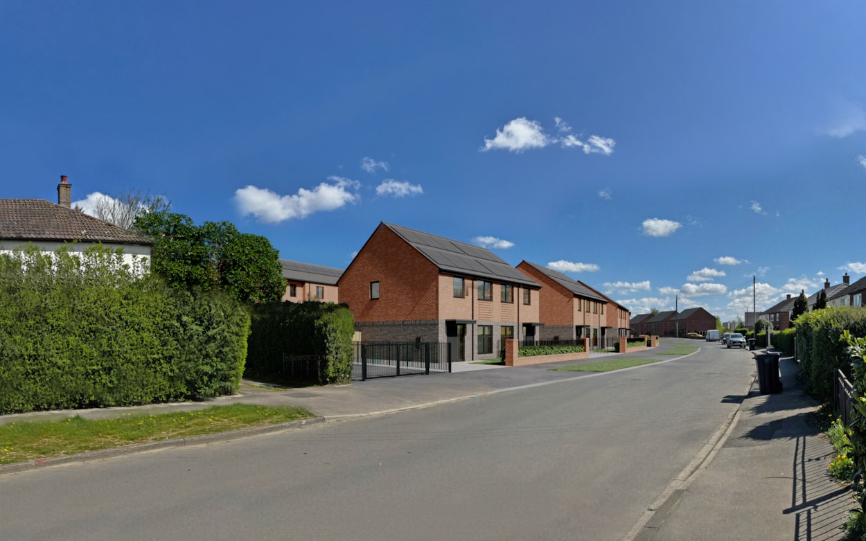 Kingsdale Leeds 2: A computer-generated image - looking east on Boggart Hill Road - showing how part of the housing development proposed for the former Kingsdale Court site in Seacroft, Leeds, could shape up.