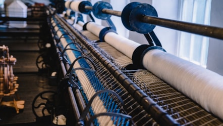 A close up of the weaving loom at the Weaving Shed in the museum.