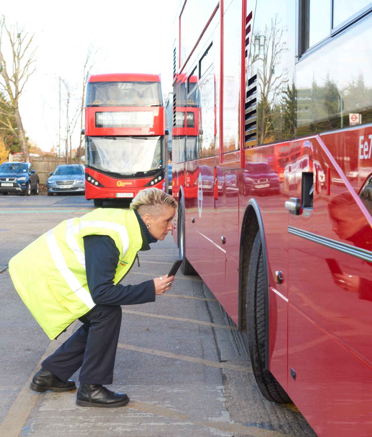 A bus driver, Kelly Myatt, carries out checks on a zero emission electric bus at Go-Ahead's Bexleyheath Depot in south-east London.