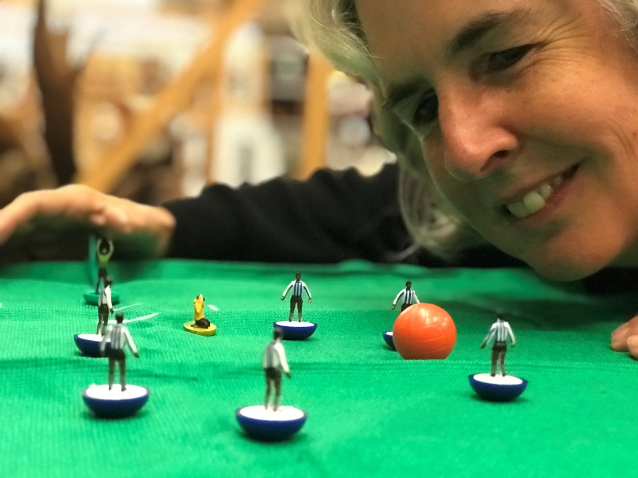 Subbuteo collection: Kitty Ross, curator of social history, tries out some of the players and accessories from the newly-acquired Subbuteo sets which have become part of the Leeds Museums and Galleries collection.