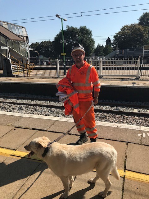Network Rail engineer Dave Lockett with Asha the dog