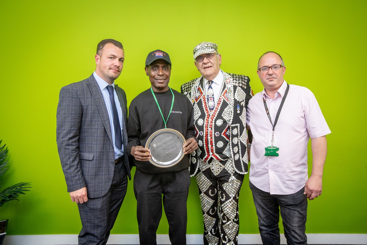 Caretaker of the Year 2019. From left: Head of Neighbourhood Services; Caretaker of the Year Francis Oduro; Pearly King of Finsbury John Walters and George Sharkey GMB Branch Secretary.