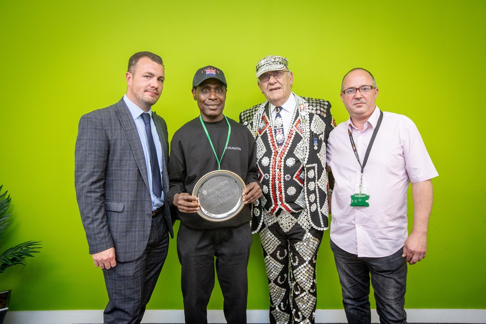 Caretaker of the Year 2019. From left: Head of Neighbourhood Services; Caretaker of the Year Francis Oduro; Pearly King of Finsbury John Walters and George Sharkey GMB Branch Secretary.