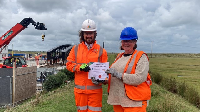 Network Rail and Natural Resource Wales’ partnership ‘on track’ to securing a greener future, combating climate change and improving rail links for passengers: Certificate with crane background HERO