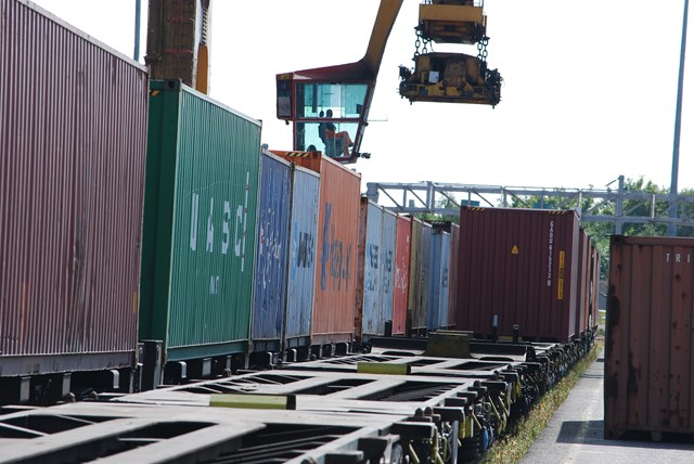 Rail freight -  wagons being loaded at a freight yard