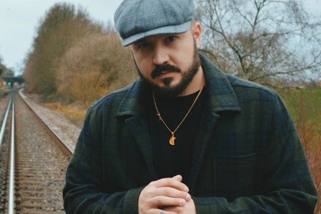 Musician apologises for picture taken on the railway near Basingstoke to promote debut single: Chris Holden - musician