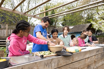 Outdoor cooking session at Three Corners Adventure Playground, part of the Holiday Activities with Food programme