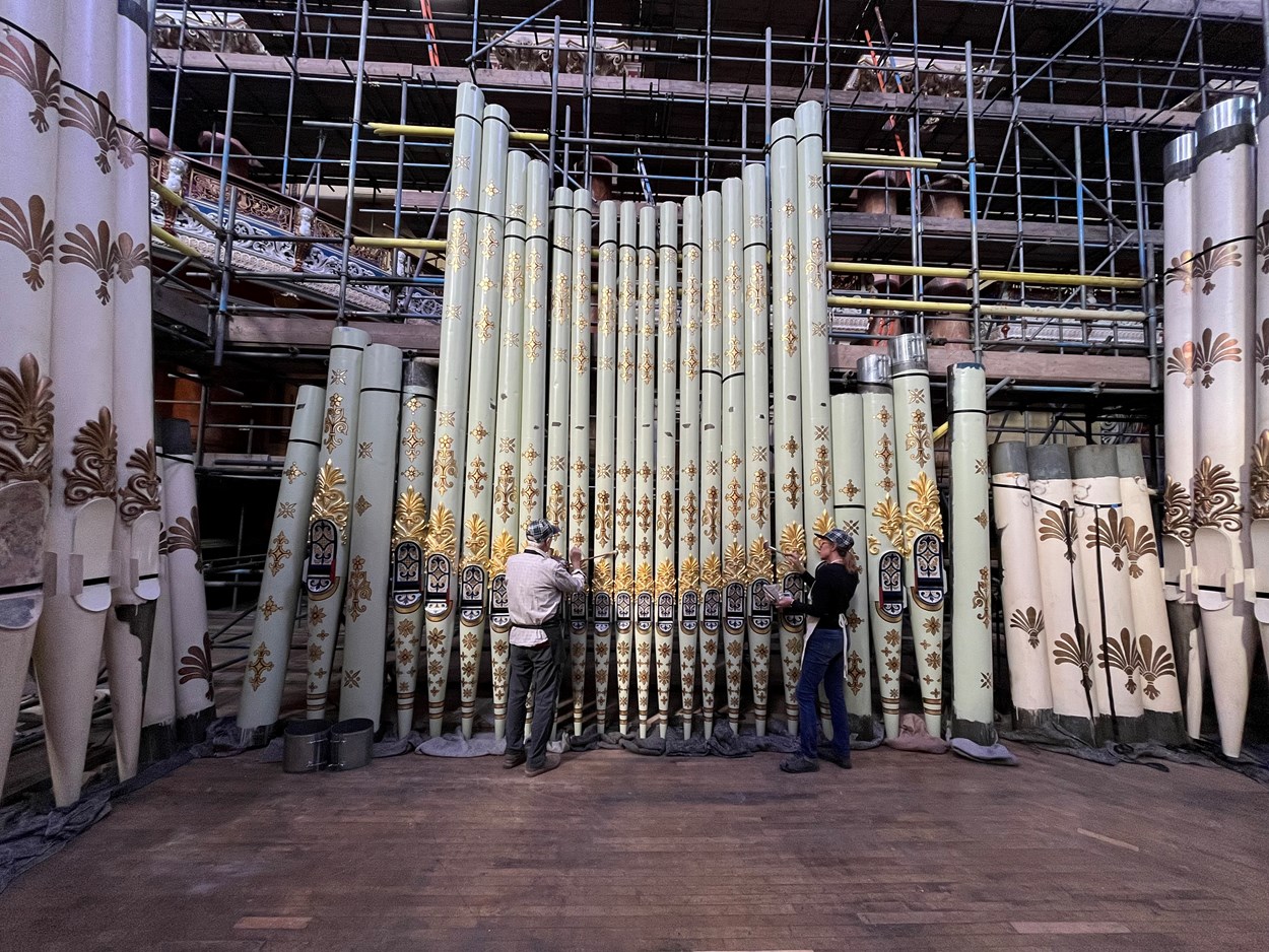 Leeds Town Hall organ pipes renewal: Specialist artists, Robert Woodland MBE and Debra Miller of The Upright Gilders, have taken on the painstaking task of recreating the spectacular appearance the organ pipes had when the iconic building’s Victoria Hall hosted the queen and other dignitaries for its opening night in 1858.