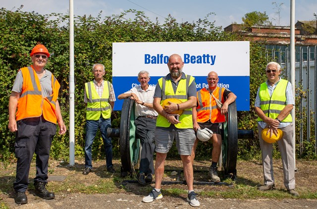 Chart Leacon: Sitting around the wheelset outside the depot is one of the tours around the site - including Colin Howland, Mark Hollingsbee, Bob Fear, Andrew Fear, John Dixon and Alan Crotty.