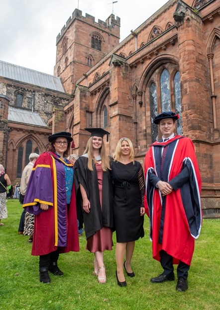 Caption: (l-r) University of Cumbria Business School lecturer Daniela Campaniolo, International Business Management graduate Rena Bijman, Dr Yvonne Klose, deputy head of DAA Wirtschaftsakademie; and senior lecturer Karam Al Mandil from the University of Cumbria’s Business School. Pictured outside Carlisle Cathedral after Rena's graduation on Thursday 21 July 2022.