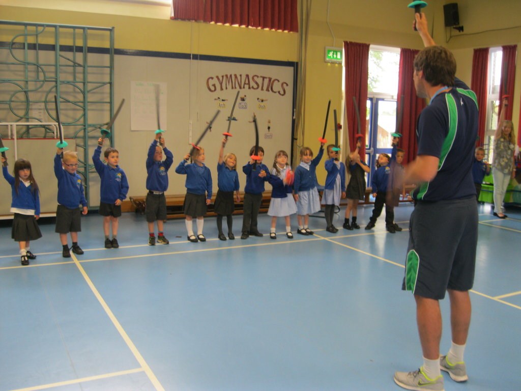 Group of P1 pupils taking part in activities in school (pre-covid restriction) - for illustrative purposes.