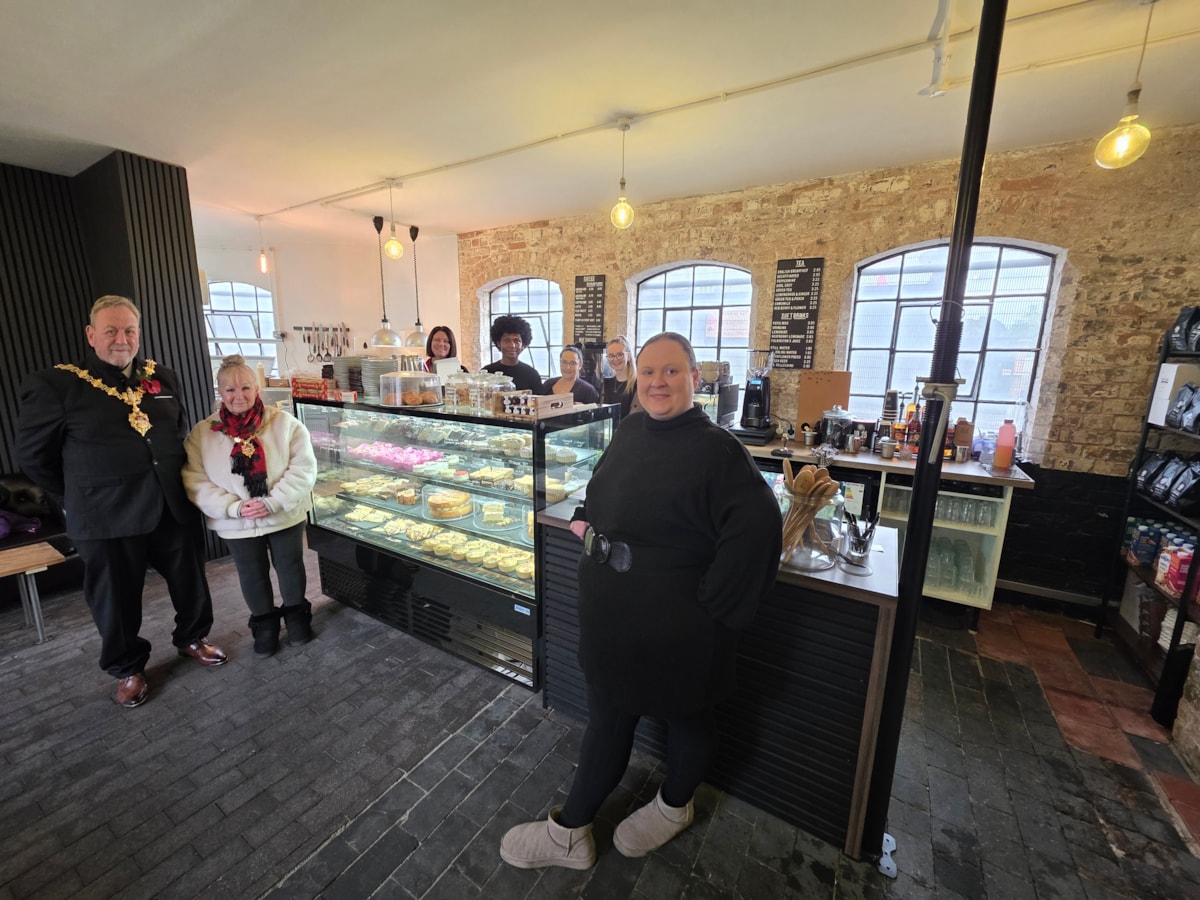 The mayor of dudley with business owner Zoe Konopka and team at the red house cone coffee shop