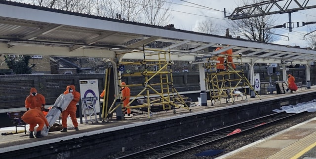 Removing an asbestos canopy at Manor Park: Removing an asbestos canopy at Manor Park