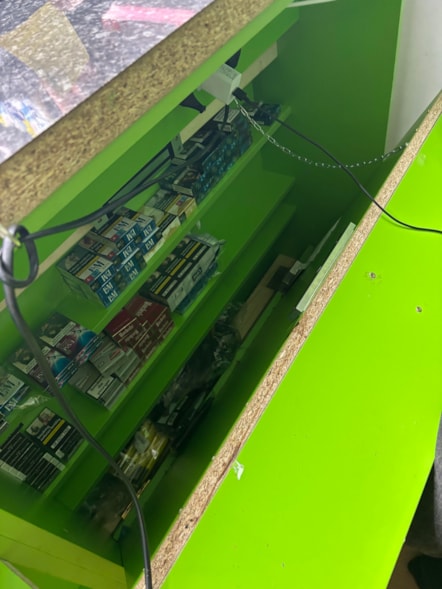 Oversized vapes were found hidden in a secret compartment in their shop.