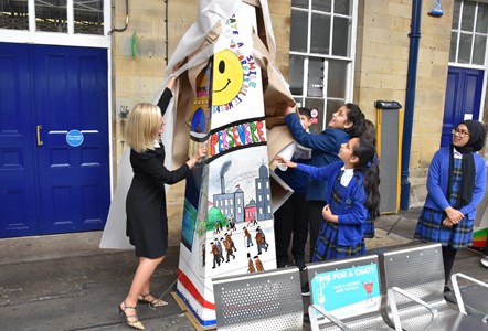 Kathryn O'Brien, Customer Service & Operations Director for TPE with pupils from Carlton Junior and Infant School in Dewsbury