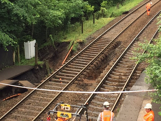 Emergency work underway to repair the railway between Buxton and Manchester: Damaged track at Middlewood station after flash floods
