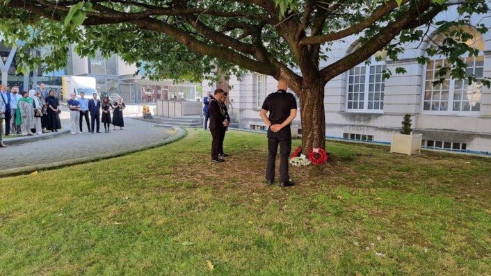 Srebrenica memorial wreaths: Wreaths laid at base of tree outside Leeds Civic Hall in memory of lives lost at Srebrenica
