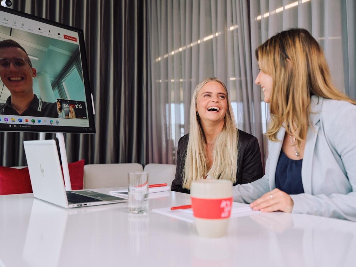 Smiling female colleagues
