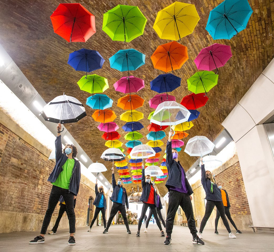 Flash mob London Bridge: Dance group Allure perform with the Umbrellas celebrating neurodiversity and National Day of Disabled Persons, at London Bridge railway station