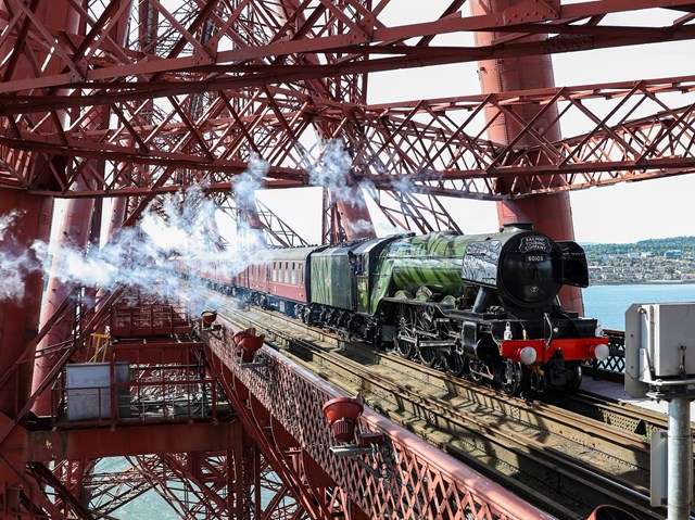 Flying Scotsman on the Forth Bridge 3 July 2023. Credit: Steve Morgan - Science Museum Group: Science Museum Group images are subject to copyright and are supplied for non-commercial editorial use in connection with this story only. For all other uses, please contact the Science and Society Picture Library: picture.library@ScienceMuseum.ac.uk