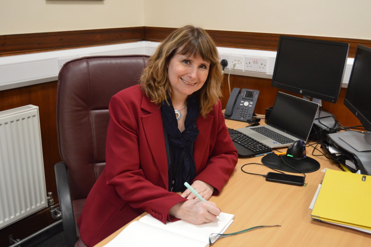 Moray Council Chief Executive, Karen Greaves BEM at desk