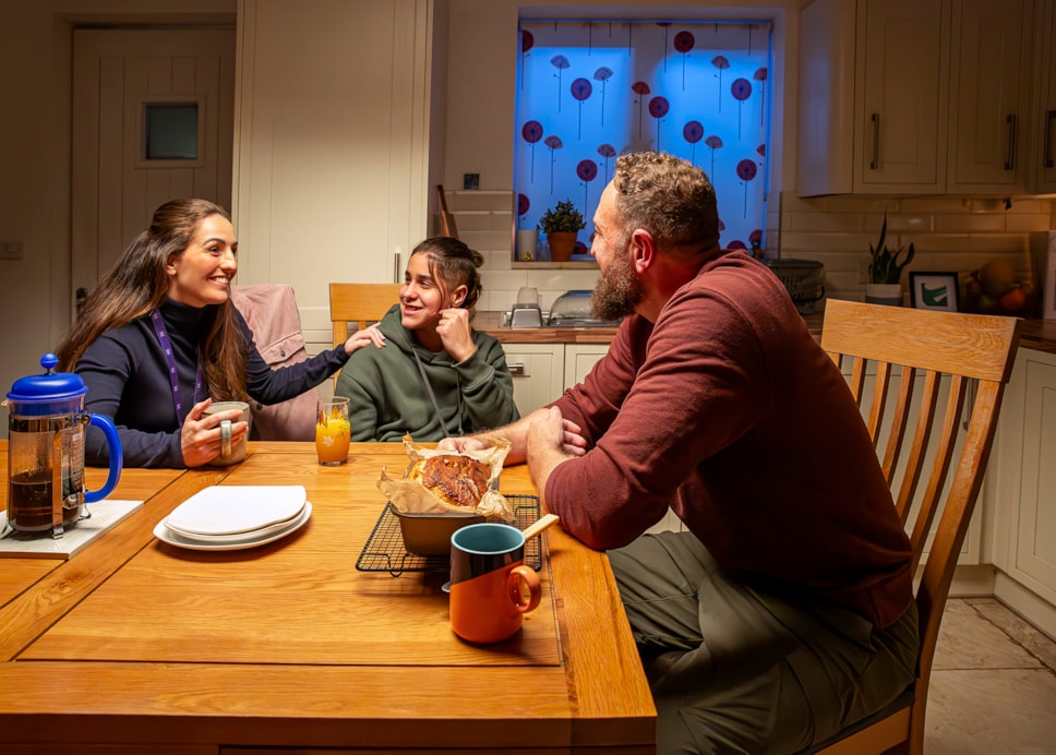 Foster Wales pic of family in kitchen