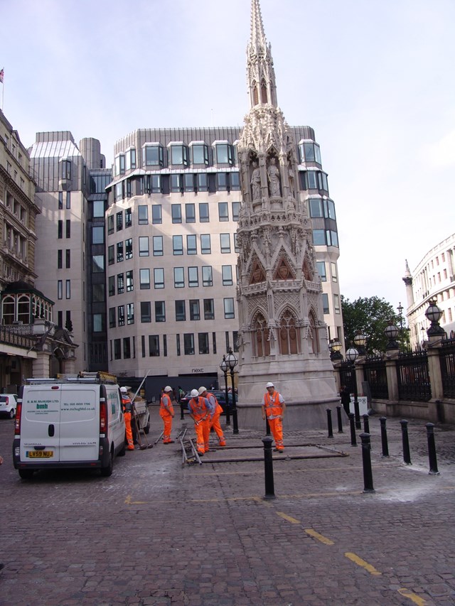 Eleanor Cross Completion_2: The final pieces of scaffolding around the Eleanor Cross are removed