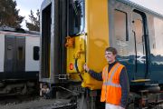 Smiling Francis Bourgeois at cab end of 455-868: Francis Bourgeois alongside 455-868 at Wimbledon Depot.