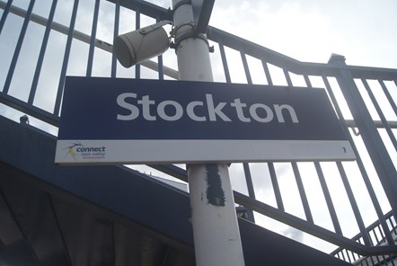 This image shows the blue and white Stockton station sign