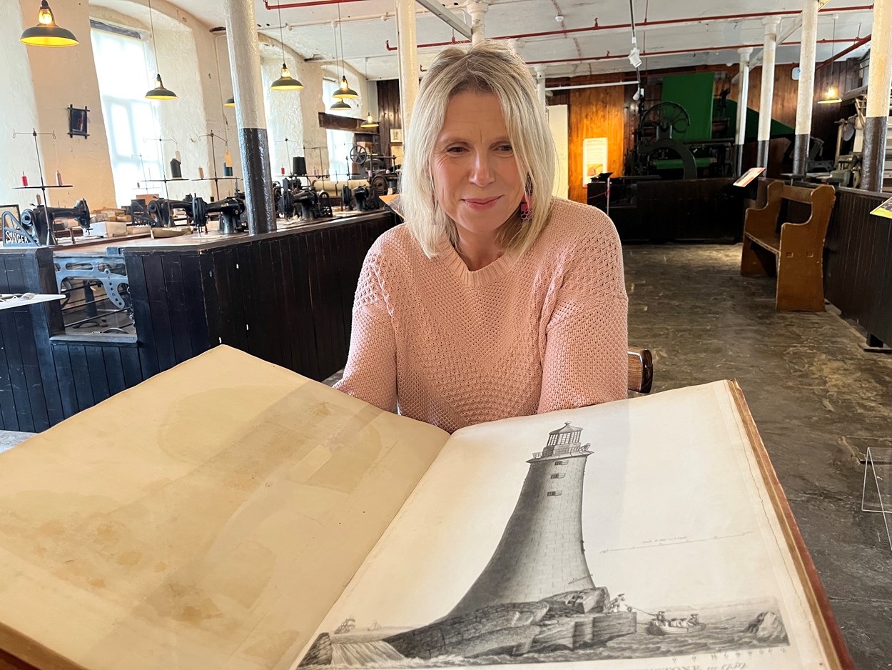 Engineery: Abby Dix-Mason of the Smeaton300 project with a book containing original plans for John Smeaton's famous Eddystone Lighthouse. The beautiful first edition, penned by Smeaton himself, is among the fascinating objects featured in Engineery, a new exhibition which has opened at Leeds Industrial Museum.