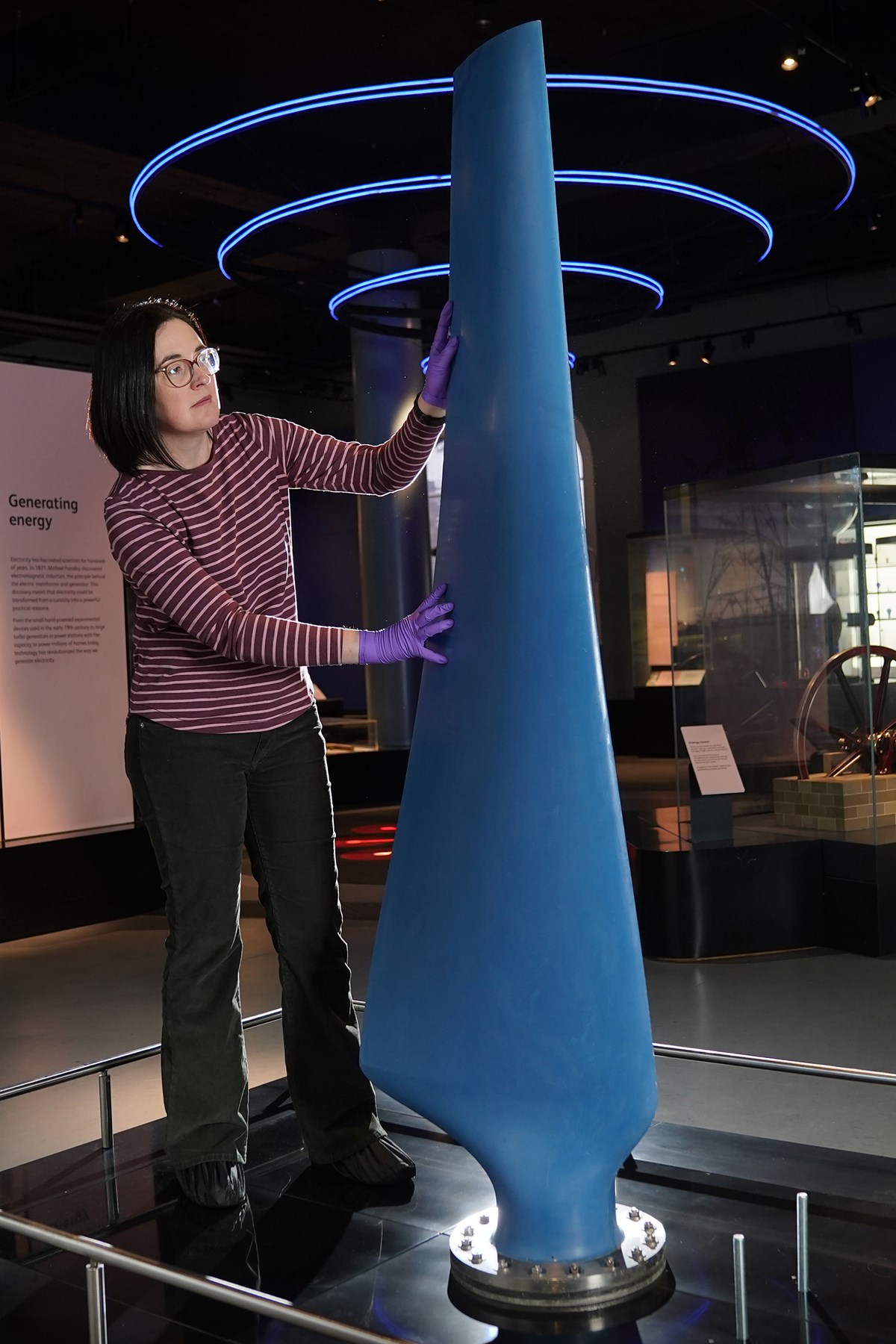 Curator Ellie Swinbank installs the Nova tidal turbine blade at the National Museum of Scotland. Image © Stewart Attwood (2)