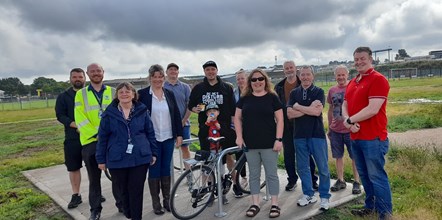 Council representatives hand over the lease of the site at Pinefield to members of the Elgin Allotment Association