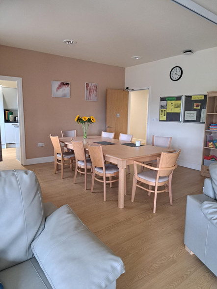 An open plan dining room and living room at the new Meadowfold Hyndburn Ribble Valley Short Break Service in Great Harwood.