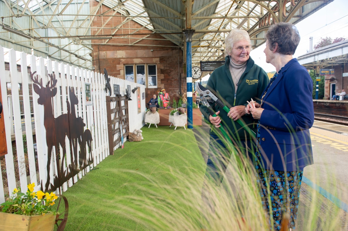From left to right: Penrith Community Gardener, Joan Robinson, welcomes Mayor of Penrith, Councillor Val Bowen to the new community picnic garden at Penrith station.