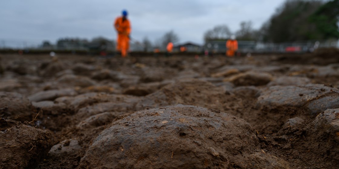 Surface of a 10m wide Roman Road uncovered during the archaeological excavation of a Roman trading settlement, Blackgrounds, South Northamptonshire: Surface of a 10m wide Roman Road uncovered during the archaeological excavation of a wealthy Roman trading settlement, known as Blackgrounds, in South Northamptonshire. 

Tags: Archaeology, Roman, Northamptonshire, Phase One, History, Heritage