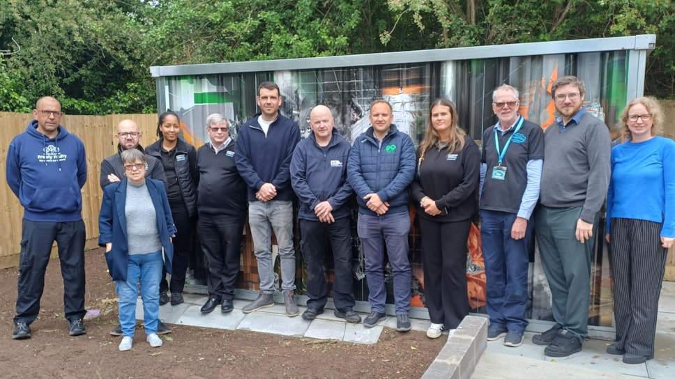 Staff from Morgan Sindall, Reading Borough Council and Whitley Wood Pantry gather at the new community garden