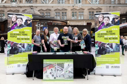 Representatives from British Transport Police, Railway Children and Avanti West Coast at Glasgow Central for the Day of Action.