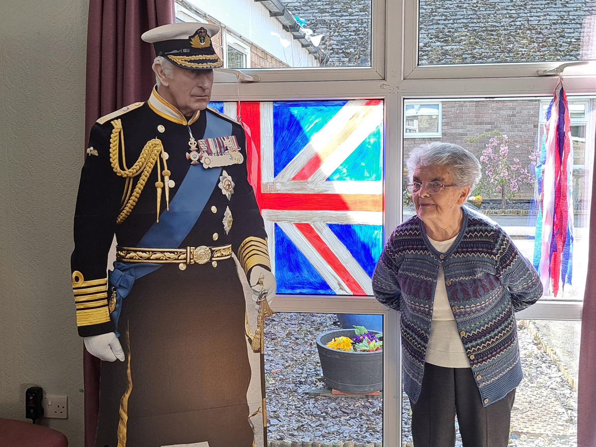 Residents at Woodlands Home for Older People, including Sheila Brunskill (pictured) will be celebrating with the life-sized cut out of King Charles III