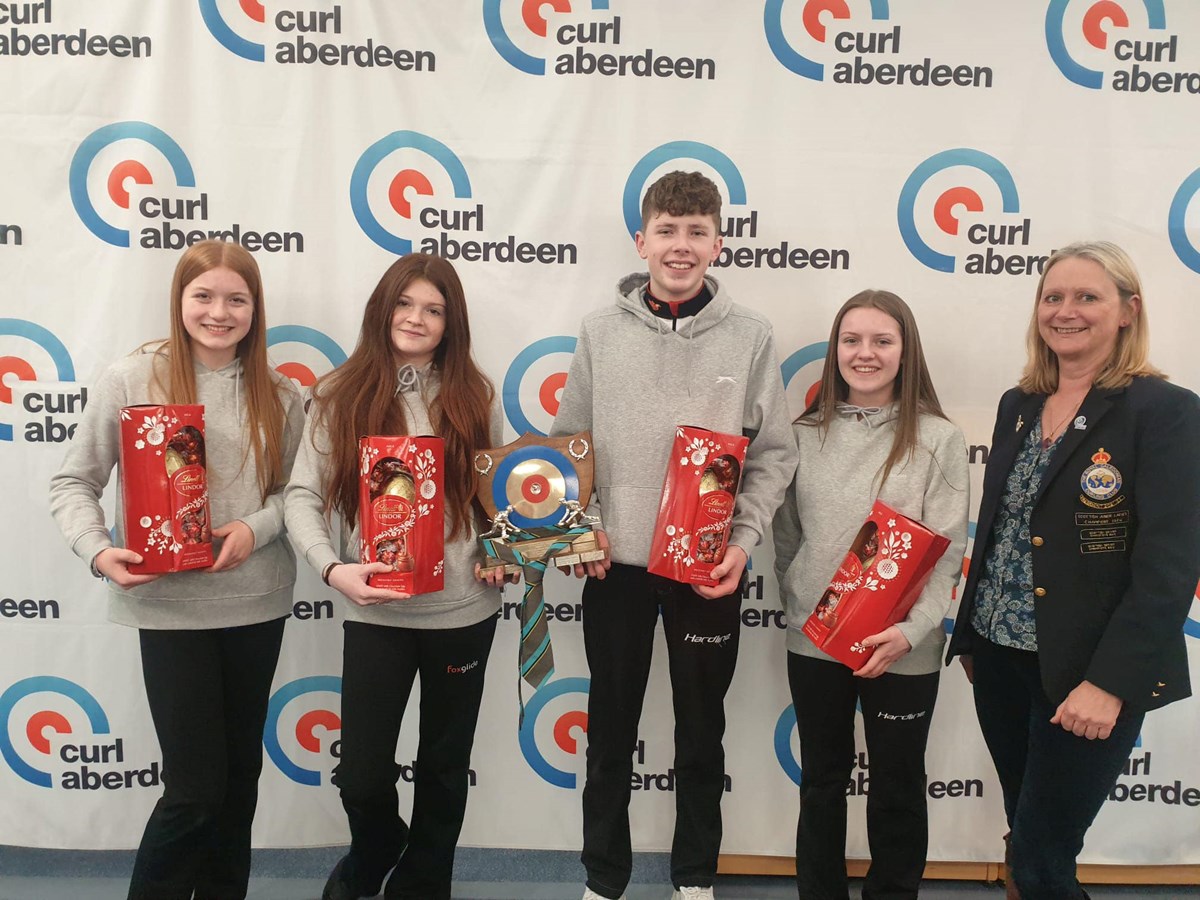 Amy, Ewan, Holly and Libby with their trophy